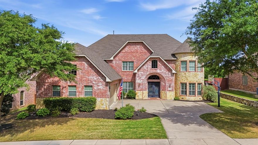 Nestled on a premier golf course lot overlooking the 13th hole of Twin Creeks, this stunning two-story home offers luxury living, exceptional updates,& a backyard designed for entertaining in highly sought-after Allen ISD. A grand foyer with extensive hardwood floors & soaring 21-ft ceilings creates an impressive welcome, while the formal dining room just off the entry features a built-in hutch for hosting. The spacious living room is filled with natural light from a dramatic wall of windows and showcases a richly painted wood beam ceiling&a cozy fireplace with a newly stained mantel.
The updated kitchen is a chef’s dream, featuring newly installed Taj Mahal quartzite countertops, an updated sink&garbage disposal, under-cabinet lighting, a large walk-in pantry, two LG dishwashers, & Electrolux double ovens&microwave. Taj Mahal continues into the laundry room & wet bar, creating a cohesive and elevated design throughout. Additional updates include refreshed light fixtures, hardware, fresh upgraded carpet on the stairs & throughout the home.
The first-floor primary suite offers a peaceful retreat with direct access to the pool, and a tranquil ensuite bath&walk-in closet. Upstairs, a curved wrought-iron staircase leads to an expansive second level complete with a game room featuring a dry bar&a media room. A unique seasonal storage closet provides the perfect place to keep holiday décor neatly tucked away. Two generously sized bedrooms with walk-in closets share a Jack-and-Jill bath, while a split secondary bedroom also features a walk-in closet & access to a full bath.
Step outside to your private backyard oasis with a sparkling heated pool&spa, serene water feature, covered patio,&breathtaking sunset views over the golf course. Additional highlights include two tankless water heaters, recent interior&exterior paint. Twin Creeks offers an exceptional lifestyle with an Arnold Palmer-designed golf course, pools, tennis courts, scenic trails, a clubhouse,&playgrounds.