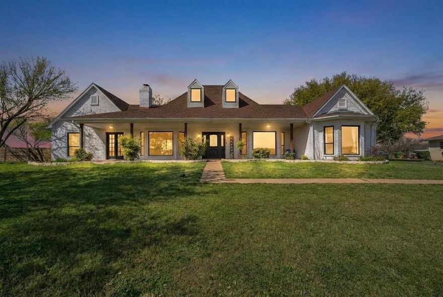 Charming Ranch with Main House, Guest House, 6 Stall Barn, and Cross-Fenced Pastures - Perfect for Equestrian Living!  Discover your dream retreat on 5.05 acres in Argyle ISD, perfectly situated with no HOA restrictions. This exceptional property features a main house with three bedrooms and three full baths, designed with a split bedroom layout for added privacy. The inviting open floor plan seamlessly connects the living area to the heart of the home—an eat in kitchen, complete with granite countertops, stainless steel appliances, a breakfast bar, and a convenient pass-through window. The formal dining room can easily be transformed into a flex-office, while a spacious mudroom-laundry room adds to the home's functionality. An adorable guest-in-law house completely updated offers one bedroom and one bath, fully equipped with its own kitchen, living room and dinette, making it ideal for visiting family or friends. Step outside to your private outdoor retreat, featuring a new pool surrounded by ample concrete decking, perfect for lounging and entertaining. The outdoor kitchen complete with a Blackstone grill and refrigerator is situated under a large covered deck providing shade and comfort. Additionally, there is a large pool house that can serve as a flex room for recreation and entertaining. The property boasts a Six-stall barn with a tack area, making it perfect for equestrian enthusiasts, and is cross-fenced for animals. This property truly offers a unique lifestyle opportunity, blending luxury and practicality in a peaceful setting. Schedule your private tour today.