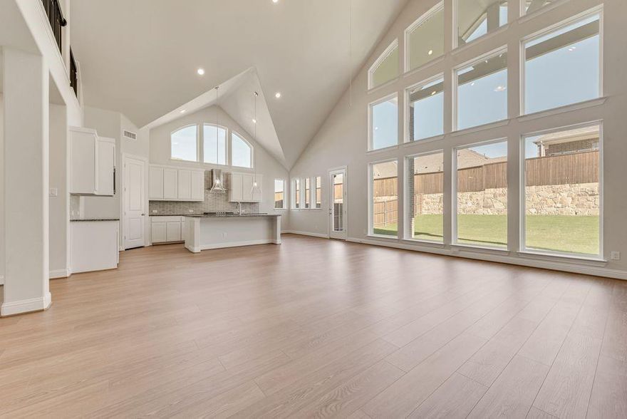 Discover this stunning new construction Grand Home in Monterra, a thoughtfully designed master-planned community offering a swimming pool, splash pad, scenic trails, park, and pickleball courts. Located in the highly acclaimed Rockwall ISD and within walking distance to the pool and pickleball courts, this home combines luxury, comfort, and convenience.
The chef’s kitchen is a standout, featuring a spacious island, Shaker-style cabinetry, a full bowl sink, granite slab countertops, stainless steel appliances, a five-burner gas cooktop, large island and a walk-in pantry—perfect for everyday living and entertaining. The open-concept family room is filled with natural light from a wall of energy-efficient windows for lots of natural light and centers around a cozy gas fireplace.
Versatile living spaces include a downstairs media room that can also serve as a formal living area or home office. The primary suite is a private retreat with a spa-like bath, complete with a freestanding tub, glass-enclosed tile shower, dual rectangular sinks, and a large walk-in closet. A guest suite is also conveniently located on the main floor.
Upstairs offers a spacious game room and a bonus area ideal for a playroom, home gym or second living space. Enjoy outdoor living with a covered back patio, perfect for relaxing or entertaining guests.
Additional features include 8-foot interior doors, Energy Star certification with R38 insulation, and a tankless water heater. Situated near Lake Ray Hubbard with easy access to shopping and dining, this home offers the perfect blend of upscale living and suburban charm.