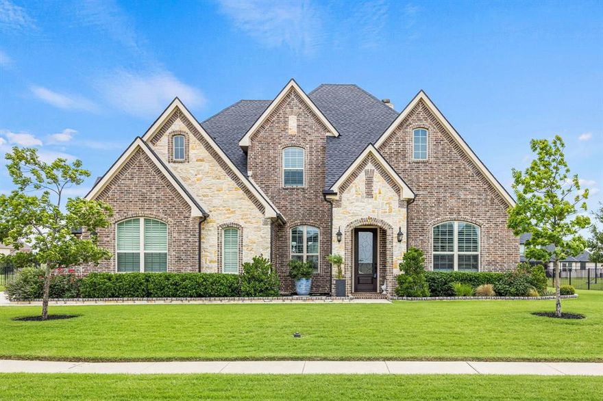 Located in the prestigious Bridges at Preston Crossings, this beautifully crafted Breezy custom home offers the perfect blend of luxury, comfort, and functionality. New exemplary Gunter Elementary School within walking distance of home. Situated on an oversized 0.52-acre lot in a serene golf course community, this residence boasts over 3,300 square feet of thoughtfully designed living space, featuring 4 spacious bedrooms and 3 full bathrooms. With a grand two-story foyer, you’ll be captivated by the sweeping staircase adorned with elegant wrought iron detailing. Rich hardwood floors and classic crown molding set a warm and refined tone through the entryway, formal dining, and expansive family room. The heart of the home is the chef-inspired kitchen, a true showpiece that combines style and function. Highlights include a large granite island with breakfast bar, custom cabinetry with under-cabinet lighting, double ovens, stainless steel appliances, gas cook top and built-in microwave. The open-concept great room is a spectacular space designed for both everyday living and entertaining. It seamlessly connects the living, dining, and kitchen areas—perfect for family gatherings or hosting friends. The primary suite, located on the main level, provides a peaceful retreat with spa-like amenities and generous closet space. A second bedroom and full bath on the first floor make for a perfect guest suite or home office option. Upstairs, you’ll find two additional bedrooms connected by a Jack and Jill bathroom, along with a spacious game or media room and a dedicated home office. Additional highlights include a 2-car garage and a separate 1-car garage, beautiful back yard with 6 ft. wrought iron fencing, new roof with transferable warranty and updated sprinkler system in front and back yards.