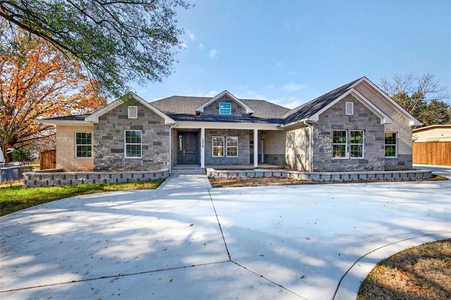 Welcome to 1809 Bluebonnet Avenue in Denison, TX, a stunning 2024-built home that blends thoughtful design with standout curb appeal. A circular drive and striking exterior set the tone, while the oversized front porch invites you to slow down and enjoy the welcoming charm of this beautiful property. Inside, this 5-bedroom, 3-bathroom home offers a functional and flexible layout ideal for today’s lifestyle. Just off the front porch is a private office with its own exterior entrance—perfect for working from home, meeting clients, or creating a quiet retreat. The main living area features vaulted ceilings, a gorgeous gas-log fireplace, and an open-concept flow into the kitchen and dining spaces, making it ideal for both everyday living and entertaining. The kitchen is a true showstopper with Dolomite countertops, custom cabinetry, stainless steel appliances, and ample workspace—designed to be the heart of the home where everyone naturally gathers. The primary suite is a peaceful getaway with a large walk-in closet and spa-like ensuite bath featuring dual sinks, a garden tub, and a separate shower. Secondary bedrooms are spacious and thoughtfully designed to maximize comfort and functionality throughout the home. Out back, enjoy a large covered patio overlooking an expansive yard with a double gate, offering excellent potential for future additions such as a shop or extra storage. A sub panel is in place to add on a pool, shop, or generator. Situated on over half an acre with no HOA, this property provides space, privacy, and versatility while still being conveniently located near schools, a short drive to Highway 75 for easy trips to the metroplex, and trails to Waterloo Lake & Park are just a block away. This home was built for the long haul with 38 drilled piers, oversized beams, and post tension cables. The home is spray foamed for added energy efficiency. Come see this home today!