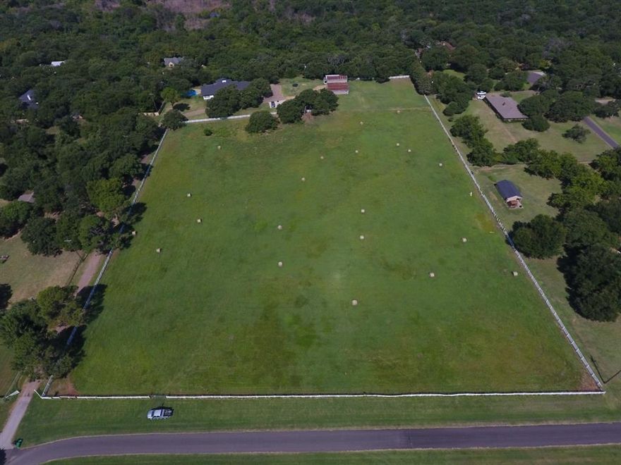 Beautiful pasture very near Lake Grapevine - almost 6 acres!  Would make a great estate property or mini-ranch.  Horses allowed.  Has current AG exemption.  No HOA . Do not enter property without agent.