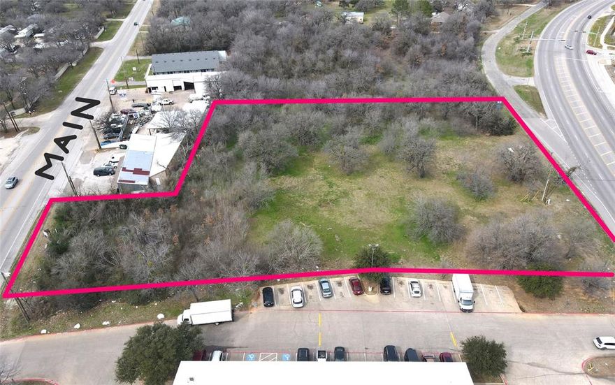 This vacant land has 102 feet frontage on Main St and 288 feet frontage on FM 157. Zoned C-2. Plans and specs available from a previous proposed medical office project. This area is building up rapidly with new apartments on the East and South, new commercial on the North, and addition commercial to the South. The U.S. Postal Office is just South of this property. Legacy High School is to the SW.

While all facts provided are believed to be true, buyer and or buyers agent must determine their reliability.