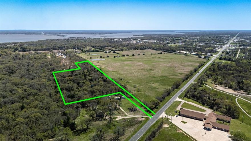 UNINCORPORATED land, just beyone city limits! Ten plus acres less than a mile as the crow flies from Cedar Creek Lake! What an exciting opportunity to own this beautiful tract that boasts towering mature native hardwoods. This heavily wooded very natural tract has so much privacy to offer! Imagine escaping the metroplex to turn off of the pavement, follow down your long winding driveway into this forest surrounding your dreamy tiny home, keep your boat trailered and ready for moments notice to launch it nearby and be out skipping across the water! This unimproved tract is next to acreage tracts on either side, you feel like you are tucked into a tree house setting and surrounded by all of the beauty and wildlife this natural forest setting offers. Just 10-15 min from local conveniences like WalMart, restaurants and Lowes. Utilities available at the highway where driveway would turn off. Highway frontage access is ample width to install a lengthy driveway back to the wooded bulk of the tract. This tract is just inside of Henderson county which is a few short miles from Kaufman county which is the current fastest growing county in the entire NATION. Investment opportunity to secure some acreage with hwy access and potential to subdivide later on!