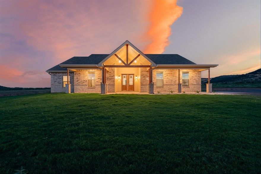 This new construction home sits on 13+ acres in Wylie West School District. This custom-built home delivers attention to detail, functional design, and great views. Located at the end of a quiet country cul-de-sac off the freshly paved County Road 321. Custom designed mailbox marks the entrance to the over-sized private driveway offering additional parking and functionality to add a detached shop. The vaulted front patio and 8 Ft double doors create a spacious and inviting entry. Open floor plan with neutral tones and abundant natural light. Gourmet kitchen with custom cabinetry with under lighting, granite counters, island, stainless steel appliances, undermount chef sink, and walk in pantry. Split-bedroom floorplan. West hallway leads to laundry room, mud bench area, guest bathroom, and the garage. Adjacent hallway leads to the primary suite with luxury vinyl floors and baseboard lighting. En-suite includes dual vanities, an oversized tiled shower with designer accents, and 2 walk-in closets. Spacious laundry room with additional hanging space, bar, and laundry chute door to primary bedroom. Additional bedrooms offer ample closet space and plush carpeting. Secondary bathroom with built-in storage, granite counters and a clean, bright design. Over-sized over 600 Sqft. garage with additional storage space. Sprinkler system. Rocked flowerbed and rain gutters to ensure ideal drainage. Ample exterior lighting. Fenced perimeter. Quiet and private while only minutes from Abilene. This home is fully move in ready, the builder planned for every detail. Southwest on Us-277, left on County Road 321, Home is at the end of the cul-de-sac.