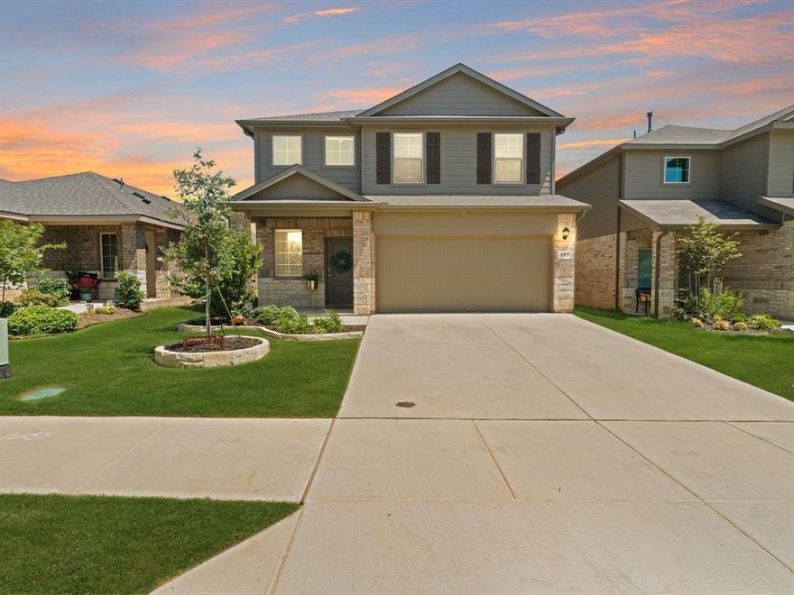 Discover this beautiful two story traditional home backing to a greenbelt lot in the master-planned community of Springhill. From the moment you step through the inviting foyer, you'll be drawn into the light-filled, open-concept layout designed for modern living. At the heart of the home, the chef-inspired kitchen features sleek Whirlpool stainless steel appliances, gas cook-top, granite counter-tops, and a large center island perfect for casual dining or gathering with friends and family. The kitchen seamlessly connects to the spacious living and dining areas, making entertaining effortless. A conveniently located bedroom and full bathroom on the main floor is perfect for multi-generational living, visiting guests, or use as a private home office. Make your way to the second floor where you'll find a versatile bonus room that could be used as a game room or second living area. The expansive primary bedroom is split from the secondary bedrooms and features a wonderful sitting area, ensuite bath and walk-in closet. Three additional bedrooms share a well-appointed full bath. The spacious backyard backs to a greenbelt and provides plenty of grass space for kids and pets to enjoy. Residents of Springhill North enjoy a wealth of amenities including a sparkling pool, playground, jogging trail, greenbelt, basketball court, and soccer field—making every day feel like a retreat.