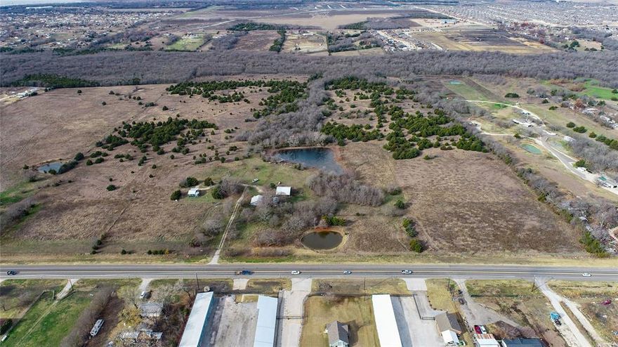 +- 87.8422 Acre development tract located in Princeton, Texas ETJ.  Property is centered in high residential growth area with ample FM 982 frontage.  Utilities on site: 10” water main, 3-phase electric and AT&T Fiber present.  Property is in Princeton CCN for sewer and is in future plan along FM 982.   Princeton has steady growth in DFW Metro area with $85,548 (6.5% growth YTD) household income and a median home price of $225,000 (9.7% Growth YTD).    2-mile radius PUDs have 7,000+ lots in construction (SFR, MF) Future use is development for single family residential, multifamily, or planned development (multi use).  2-mile area has multiple planned developments in area with 7,441 lots either developed and in development.  The subject is currently ag exempt and in the Princeton ETJ. Ready for entitlements right for buyer.  No known restrictions.