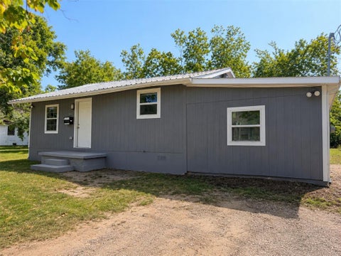 Photo of 1306 Locust Street, Commerce, TX 75428 (MLS # 21368469)