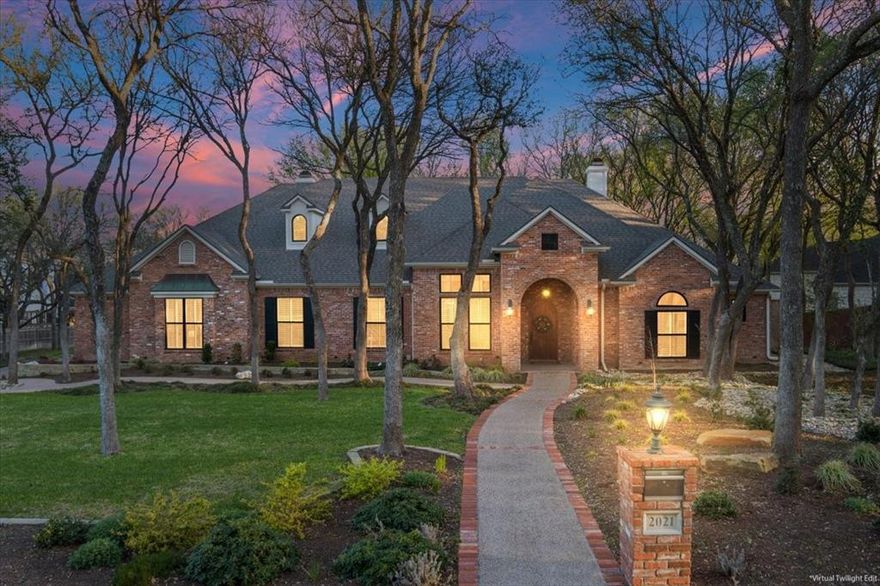 Welcome to this immaculate Hidden Valley masterpiece — a fully remodeled 4-bedroom, 4-bath home offering exceptional space, privacy, and luxury. Featuring three expansive living areas, a private study, and a dedicated media room, every detail has been thoughtfully updated to create a space that is both elegant and highly livable. The home offers beautiful curb appeal with magazine-worthy landscaping and a backyard designed for both relaxation and entertaining. Enjoy serene wooded views and a peaceful creek from the firepit and outdoor living areas, creating a private retreat in the heart of Hidden Valley. Inside, two stunning main living spaces anchor the home — a formal living room and a second living area that flows seamlessly from the chef’s kitchen — both featuring gas fireplaces. A third living area along the guest wing provides additional flexibility for entertaining. The chef’s kitchen features a center island, double ovens, recently installed appliances, abundant cabinetry, and a walk-in pantry. The isolated primary suite features a spa-inspired bathroom with dual vanities, a freestanding soaking tub, an oversized tiled steam shower, and a spacious walk-in closet. Upstairs, the media room above the garage creates the ultimate movie-night experience with theater seating, a projector system, and a serving bar. Additional features include a custom pool by Aquanauts Custom Pools & Spa, a Control4 sound system, a Sub-Zero wine refrigerator, three recently replaced HVAC systems, a spacious utility room with a sink and extra refrigerator space, two gas fireplaces, and a 3-car garage with epoxy floors.  The backyard offers a true resort-style setting with a covered and screened patio, lush landscaping with tree lighting, afternoon shade, and a custom pool designed for year-round enjoyment. Located in Midway ISD and zoned to South Bosque Elementary, River Valley Middle School, and Midway High School.