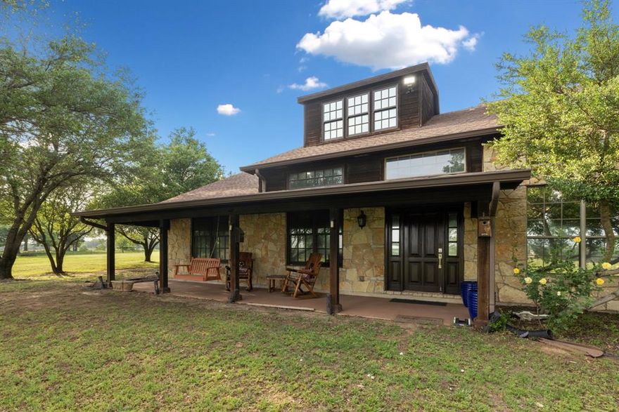 Welcome to Kava Ranch – A Private Oasis in the Heart of Argyle Welcome to your private ranch retreat on 12.54 acres in sought-after Argyle—where modern upgrades meet timeless charm. This fully renovated 4,397 sq ft home offers both convenience and tranquility. Inside, you’ll find 4 spacious bedrooms (2 bedrooms downstairs, 2 bedrooms upstairs with ensuite bathrooms), 4 bathrooms, a dedicated office with a built-in 250-gallon fish tank, and a large family room featuring high ceilings, hand-scraped wood floors, and wood fireplace add character and warmth throughout. The gourmet kitchen is a chef’s dream, complete with premium appliances and elegant finishes. The luxurious primary suite includes a spa-like bathroom and a generous walk-in closet. Step outside to unwind by the sparkling pool or host unforgettable gatherings in the air-conditioned party barn—complete with a bar, kitchenette, and wine cooler. Perfect for animal lovers, the property includes loafing sheds, a chicken coop, and multiple storage buildings all with picturesque views of the pond. Additional features: 3-car garage, in-ground storm shelter, energy-efficient LED lighting, and a Trinity aquifer well for irrigation.