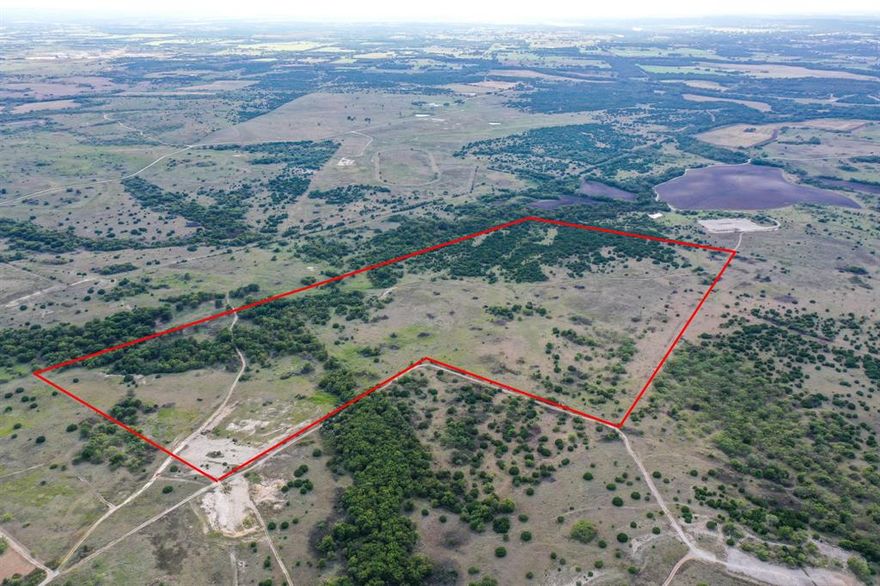 Brand New 60ft easement granted off Hwy 171 for the future owner of this tract's use ONLY.  This is your chance to own 84.89 acres of stunning ranch land just south of Weatherford! Featuring a diverse landscape with rolling terrain, majestic hardwoods, and wide-open fields perfect for grazing cattle, private ranch or a future development, this property is a rare find. A natural creek winds through the middle, attracting abundant wildlife—making it an absolute paradise for hunters and nature lovers alike. Whether you're dreaming of building a magnificent ranch estate, a weekend hunting retreat, or simply securing a piece of Texas land to call your own, this property delivers the perfect blend of privacy and convenience.  Escape the hustle and bustle of city life and enjoy the peace and quiet of true country living—without sacrificing accessibility! You're just minutes from Hwy 171, making for an easy drive into Weatherford, a thriving and growing community with excellent amenities, year-round events, and even a brand-new Costco. Opportunities like this don’t come around often! Don't wait—come see this breathtaking property!  Additional adjoining 44 acre parcel to the north is also available to purchase at same price per acre.