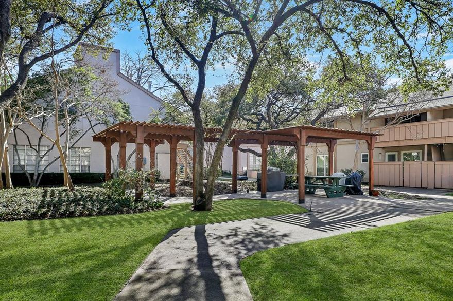 Spacious 1-Bedroom Retreat in High Hollows North. Step into this beautifully refreshed 1-bedroom, 1-bath condo in the well-established High Hollows North Condominiums—a hidden gem surrounded by lush, mature trees. Freshly painted and thoughtfully updated, the expansive living and dining area offers the perfect setting for entertaining guests or unwinding in comfort. The generously sized bedroom features a walk-in closet that not only provides custom storage but also accommodates a stacking washer and dryer, which are included with the property. The bathroom has been elegantly upgraded with brand-new quartzite countertops, modern lighting, stylish fixtures, and sleek vinyl flooring. In the kitchen, you'll find granite countertops, a classic tile backsplash, and updated flooring, complemented by a stainless steel refrigerator that stays with the home. Sip your morning coffee or relax in the evening on your rebuilt balcony, nestled among the trees for a touch of tranquility. A covered parking space is conveniently located just steps from your door. Residents enjoy access to multiple pools, grilling areas, and beautifully landscaped grounds. Plus, the HOA covers most utilities, making life here even more effortless. Don’t miss this chance to call High Hollows North home!