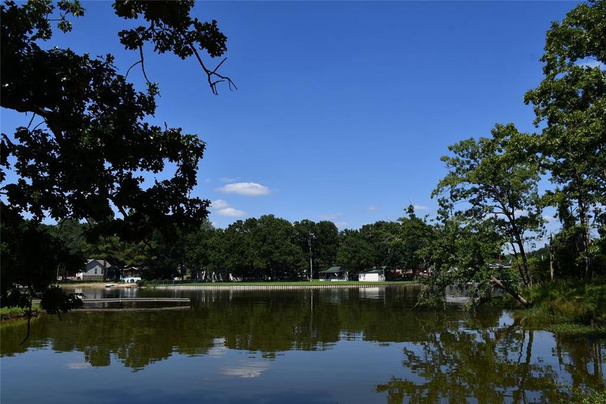 Don’t miss this incredible opportunity to own a beautiful waterfront lot located on a spacious, protected cove of Cedar Creek Reservoir. This prime lot boasts over 60 feet of serene shoreline, offering the perfect setting to enjoy peaceful lake living. Nestled in one of the most desirable areas of the lake, the property features breathtaking open water views and gentle breezes, making it an ideal location for your dream lake house, weekend retreat, or short-term rental investment.

Enjoy easy access to the water with a small private dock, perfect for fishing, tying up a boat, or simply unwinding by the lake. The lot is less than a block from a private boat ramp, offering convenience for boating and water recreation. Manufactured homes are allowed, giving you flexible building options to suit your lifestyle and budget.

Surrounded by natural beauty and located in a quiet, relaxing area, this lot is priced below appraised value by motivated sellers, making it an exceptional deal. Whether you're looking to build, invest, or escape to the water, this rare waterfront gem won’t last long.