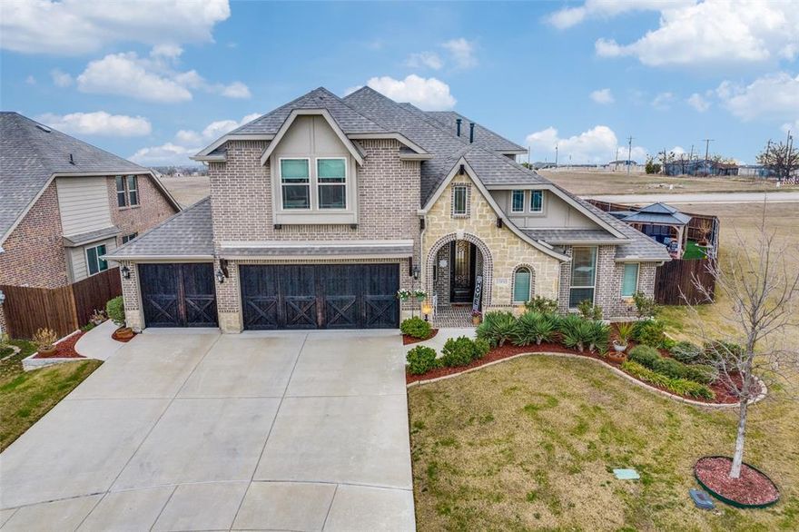 Like New SHOWSTOPPER Carolina IV Model with 70,000 in backyard upgrades on an oversized private lot! Meticulous, mature landscape welcomes you into the 12ft wide rotunda with scraped hardwoods, bullnose corners, high-end custom window treatments, and art niches throughout! The formal study w french doors is perfect for remote work. The formal dining is nestled among custom archways, creating a grand dining experience. The living room has a stone hearth gas start fireplace. The kitchen boasts a large island w bar seating, stainless appliances, a 5 burner gas stovetop, coffee bar, built-in microwave and sunny breakfast room with custom window seat covering. The primary ensuite has a sitting room, dual sink vanity, large walk-in shower w bench, soaker tub and grand walk-in closet. The two secondary beds down both have built-in cabinets & window seats. Upstairs find a large second living room and a dedicated media with prewired surround sound. An additional study-up is ideal for retreating. The ensuite upstairs is oversized w sitting area, two closets, & full bath. Outside owners added upgraded turf, a 15ft swim spa on an elevated platform, a 15x10 covered patio, 37ft concrete walkway, crushed gravel paths, 6x5 grill pergola, 11x9 retreat cabana and an additional open paver patio. No neighbor to the East and no neighbor Behind!