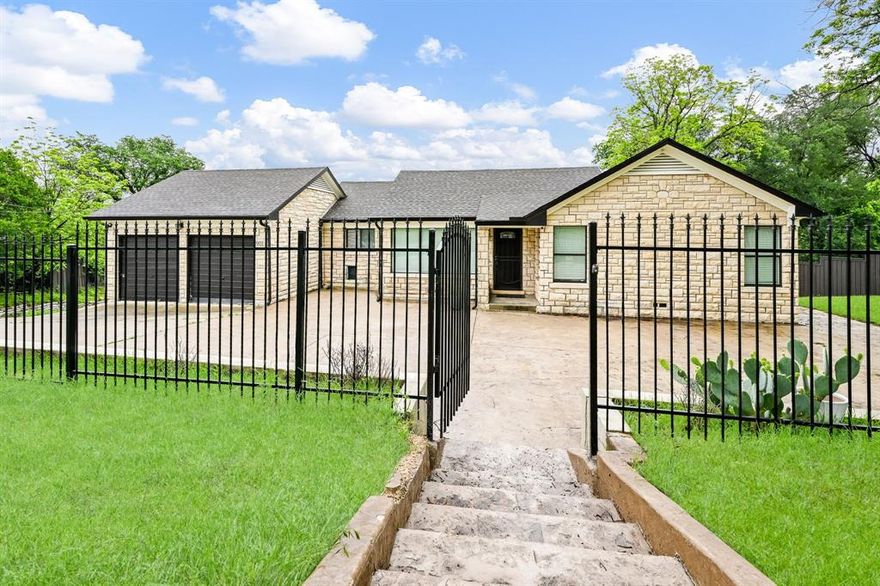 A TRULY RARE FIND WITH NEARLY **2.5 ACRES** JUST 10 MINUTES OUTSIDE THE CORE OF FORT WORTH. THE OPPORTUNITIES HERE ARE ENDLESS. This is the one you have been waiting for; a home plus land close to the city but not too close! But it gets even better, the land also has frontage along Hillside Dr., which opens several possibilities from subdividing to an additional structure. Do you have lots of trucks and toys, you have the room! Always wanted a pole barn, build it, you have the room! Plus, it is peaceful & private. Inside, the main level offers two generously sized bedrooms, each with a private ensuite bathroom (two primary bedrooms) The centerpiece of the home is the updated modern kitchen featuring a designer two-tone aesthetic, higher-end SS appliances, waterfall quartz peninsula, gas cooktop, built-in, cabinet-front refrigerator & dishwasher, huge vent hood and dual breakfast bars. You have adjacent breakfast room with door leading to a huge terrace overlooking your acreage – ideal for entertaining, relaxing or enjoying the wildlife. The open living space is enhanced by LVP flooring, updated lighting, and a sleek built-in entertainment wall. Thanks to the natural topography, the lower level offers direct exterior access by way of your terrace, creating flexible options for that space. You have over 1,000 SF of finished and unfinished space to utilize! The finished space includes a renovated bedroom and bathroom. This surprising bonus can add some great square footage to your home. The garage is plumbed for laundry and can function as-is for parking or storage or you can convert back into a usable two car garage. Last, but certainly not least, is the location itself; minutes to the Downtown, the Stockyards, Billy Bob’s, West 7th, Panther Island, NAS Fort Worth JRB, and the Cultural District. Positioned in the evolving River District near the Rock Island redevelopment and Panther Island project, this home offers a unique blend of lifestyle & investment potential.