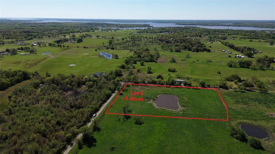 Beautiful 4.98+- acreage corner property. Large pond and beautiful building spot. Restricted to site built only 1000 sq ft and up. Lake Fork is just minutes away! Co-op water and co-op electric available. Septic tank required. All information is approximate. Buyer and buyers agent to verify. Additional acreage tracts available.