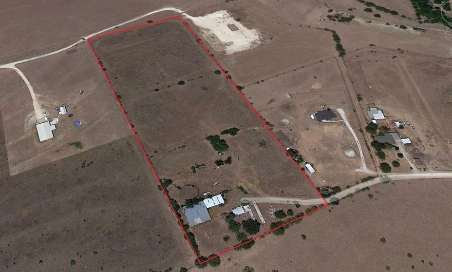 10 Acres Total with about 8 Acres in Pasture with Cross Fencing, Corrals, Round Pen, Wash Rack, and Lighted Arena. Metal Barn with 5 Pipe Stalls, 70 X 60 Working Area, Tack Room, Workshop, and Small Loft Apartment. Barns and Shops need TLC and Clean Up but would be a Perfect Place to Bring the Animals & Build Your Dream Home! It's also just down a Private Drive from the New 171 Food Row and well known Del Norte Taco; that both have Live Bands, Great Food, and Drinks every weekend in the spring and summer.  Utilities are all present; the home was removed off property in 2017. Water line will need to be repaired or a water well put in. Owned Mineral Rights will Convey to Buyer!