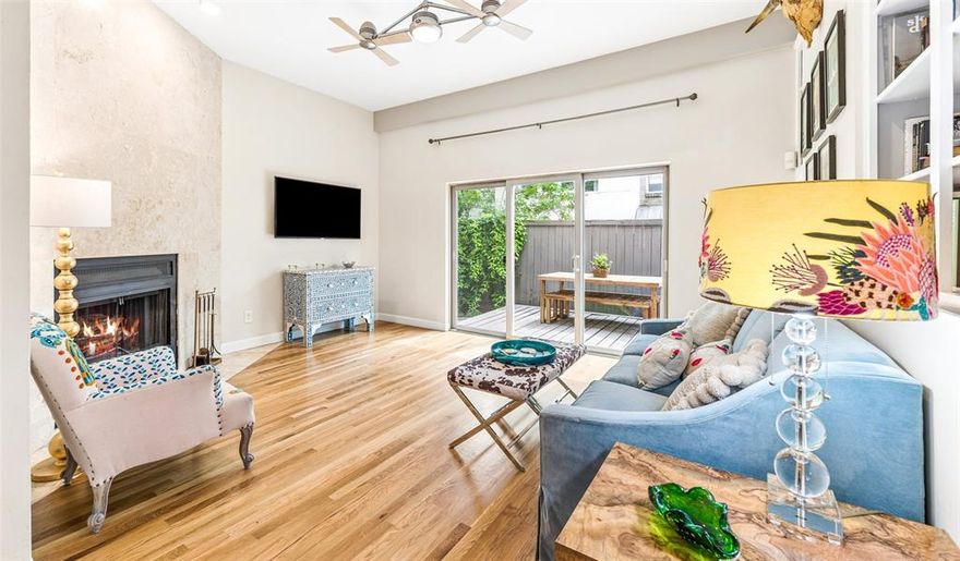 Totally unique and full of charm, this Uptown Dallas condo offers a rare blend of privacy, outdoor living, and unbeatable walkability near the Katy Trail and Knox Henderson.  Located within an intimate five-unit gated community, this one-of-a-kind Dallas condo is the only residence featuring a private turfed yard—perfect for dog lovers or anyone seeking a peaceful outdoor space in the heart of the city.  Ideally situated just one block from the Katy Trail and minutes from Uptown Dallas and Knox Henderson, this walkable location provides easy access to some of Dallas’ best dining, shopping, and entertainment.  The first floor features a warm and inviting living area with a wood-burning fireplace, opening seamlessly to a private deck and yard—creating the perfect setting for indoor-outdoor living and entertaining. The kitchen is equipped with granite countertops, stainless steel appliances, and convenient access to a stylish dry bar with wine refrigerator, along with a nearby powder bath.  Upstairs, the light-filled primary bedroom and guest bedroom offer comfort and privacy, complemented by a well-appointed full bath.  Additional highlights include two assigned parking spaces—an exceptional convenience for a condo in Uptown Dallas near the Katy Trail.