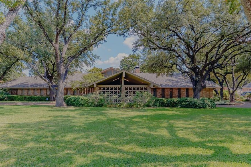 First opportunity in 70 years to purchase this Mayflower Estates property with an expansive 1.28 acres, backing to Browning Creek! This one-owner mid-century home was built in 1953 and remodeled in 1965. The generous lot provides ample space for the sprawling one-story home, pool and tennis court as well as an underground storm shelter at the rear of the property. Although the custom built home has many lovely details, the value is in the land and the property is being sold as-is. Please do not walk the lot without an appointment. The house is occupied.