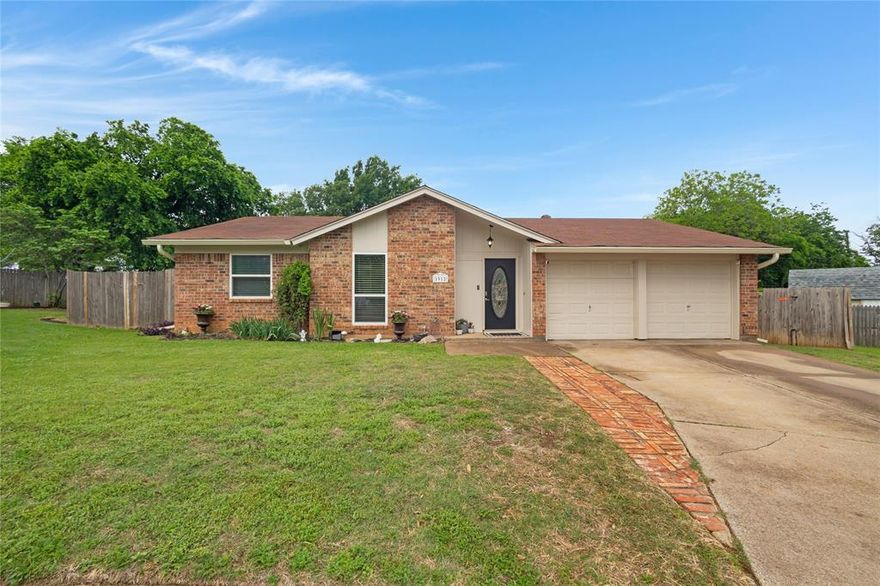Charming Texas ranch-style home in Arlington offering style, flexibility, and the kind of updates YOU are looking for. From the moment you step inside, you’ll notice the impressive cathedral ceilings with exposed beams that create an open, airy living space full of character and warmth—perfect for both relaxing evenings and hosting friends and family.

Major recent improvements provide true move-in confidence, including new laminate flooring, new carpet in the primary bedroom, and a new AC system—all installed in 2026. Fresh interior and exterior paint completed in 2025 gives the home a clean, modern feel, while gutters added in 2025 improve drainage and long-term exterior maintenance. The water heater was replaced in 2024, providing one more recent update.

A standout feature of the home is the spacious rear addition designed to adapt to a variety of lifestyles. The first bonus room can serve as a formal dining area, second living room, media room, playroom, homeschool space, or entertaining area. The second versatile room offers excellent potential as a private home office, craft or hobby room, fitness or yoga studio, study area, or a quiet retreat.

Whether you're a first-time buyer, downsizing, or simply looking for a well-maintained home with functional extra space, this property delivers comfort, versatility, and peace of mind. Conveniently located near shopping, dining, schools, entertainment, and major highways, this Arlington home makes daily life and commuting simple while offering a place you’ll be proud to call home.