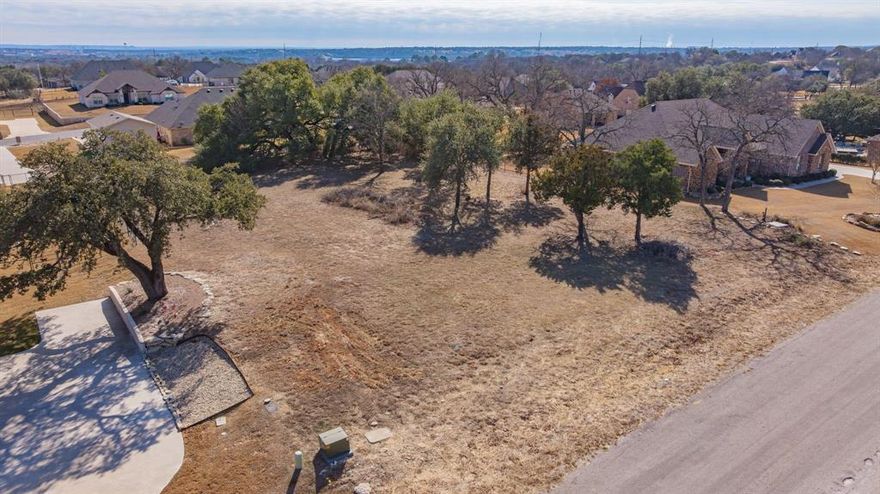 This lot located in DeCordova Ranch can be yours to build your own custom home. Situated on half an acre, this is the perfect opportunity to build in this premiere community. Buyers, text agent for code to drive by and view the lot.