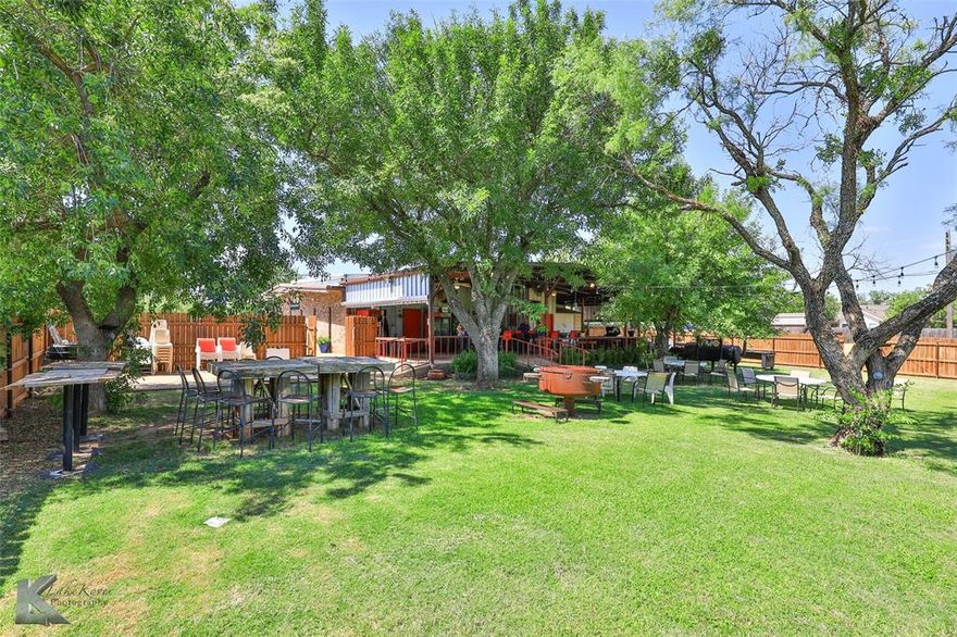 OWNER WILL CONSIDER ALL REASONABLE OFFERS!  Beautiful Office and Event Venue Ready for you business!  A wide variety of businesses would find this beautiful place to be the perfect home.  Venue can host large events and is fully equipped with kitchen and plenty of grills and smokers, and a bar.  Three sliding door coolers are included to make it easier for anyone utilizing the space.  Plenty of tables and chairs are also included and an air conditioned bathroom.  Family reunions, parties, weddings, fund raisers, etc. have all happened here.  Plenty of parking for the venue in lot behind the main building.  Beautiful and well appointed outdoor area.  Venue currently rents at $1000 per day.  Office contains five renovated executive offices and a conference area, as well a break area and kitchenette.  Owner is relocating.