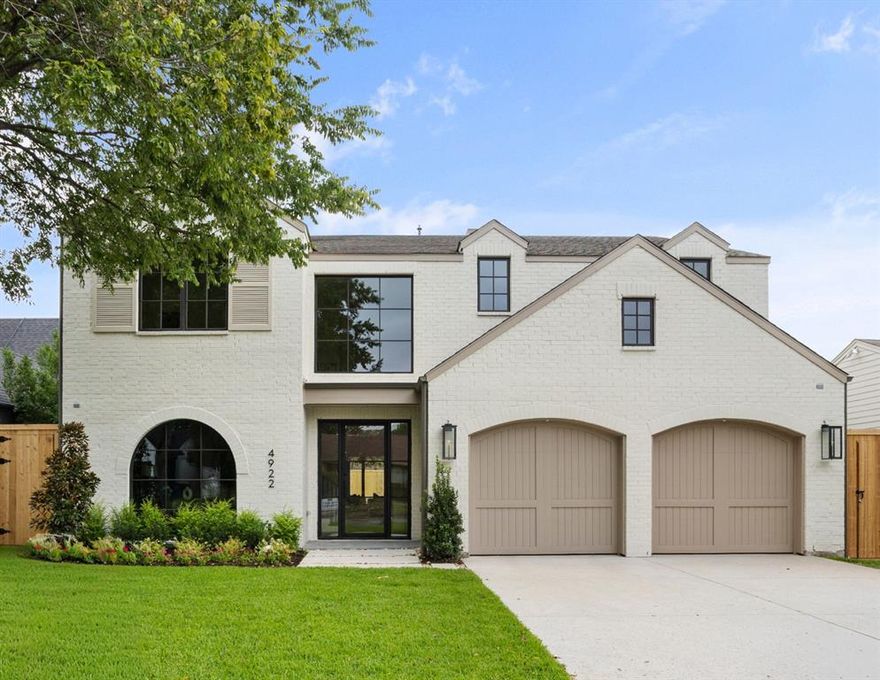 Experience the pinnacle of craftsmanship in this meticulously designed 4-bedroom, 4.1-bath residence spanning 4,489 sq ft, thoughtfully created by renowned builder Olerio Homes. Perfectly situated just steps from the vibrant shops and restaurants of Inwood Village, this home offers both luxury and lifestyle. Exuding a soft contemporary feel, the interiors showcase solid oak wood flooring, smooth wall finishes, designer lighting, and custom white oak cabinetry throughout. The expansive kitchen, living, and dining areas are designed for effortless entertaining, with a chef’s kitchen featuring high-end appliances and a hidden walk-in pantry for seamless organization. The primary suite provides a serene retreat, complete with a spa-like bath featuring a freestanding tub and an expansive custom closet. Upstairs, enjoy an oversized game room with a built-in bar and three additional en suite bedrooms. Step outside to an elevated outdoor living space, highlighted by a spacious covered patio and gas fireplace—perfect for year-round entertaining. This stunning residence is where thoughtful design meets effortless luxury, crafted for those who appreciate the finest in modern living.