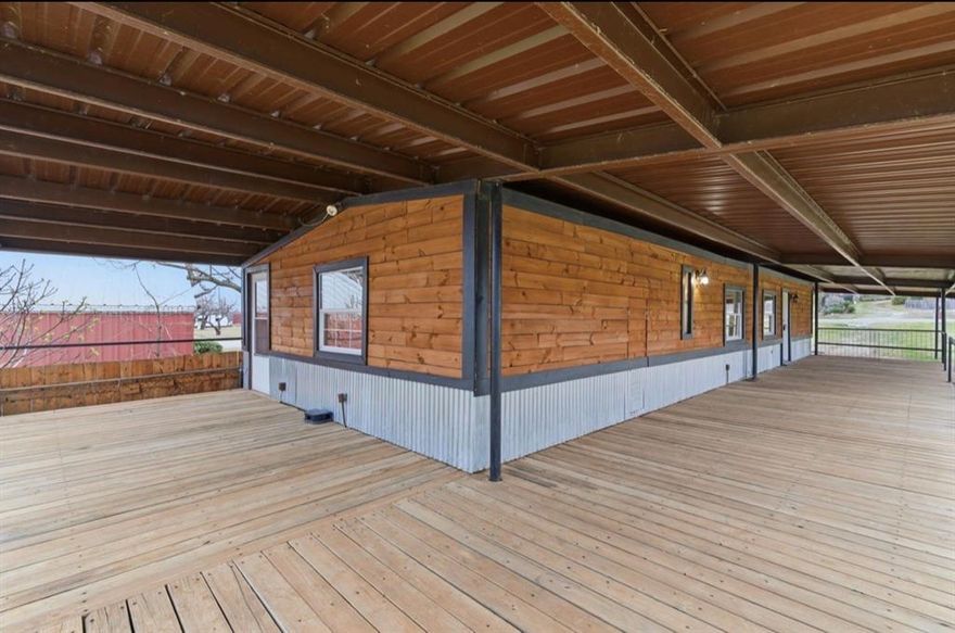 Enjoy lake living at this charming property on Hubbard Creek Lake in Breckenridge. With peaceful water views and direct access to the lake, this property offers the perfect setting for fishing, boating, and relaxing weekends by the water.

Inside, the home features a spacious living room that flows into the eat-in kitchen, creating a comfortable layout for everyday living or gathering with family and friends. The home includes one bedroom, one bathroom, a laundry area, and an additional foyer-entry room that provides extra space and functionality.

A large covered porch stretches across the front of the home, offering a great place to sit, relax, and enjoy the lake views and quiet surroundings.

Outside, the property includes covered parking, fenced yard space, and a walkway leading to the private dock extending toward the lake, making it easy to enjoy fishing, boating, and time on the water.

Whether you’re looking for a weekend getaway, fishing retreat, or full time home, this home offers a great opportunity to enjoy life at Hubbard Creek Lake while still being conveniently located near Breckenridge.