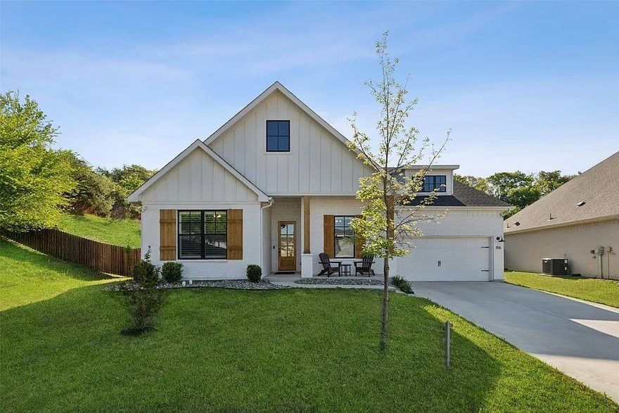 Enter into the charm and comfort of this beautifully updated 4-bedroom, 3-bath home on a cul-
de-sac in desirable Willow Park, with a private and expansive lot (one of the largest in The
Reserves at Trinity) that backs up to a gorgeous rock wall! From the moment you enter, you're
greeted by natural light, modern elegance, and a warm, welcoming atmosphere. At the heart of
the home, the vaulted living room features striking wood beams and a stately wood-burning
fireplace—perfect for cozy gatherings. The thoughtfully designed kitchen is a dream for both
everyday living and entertaining, complete with an island with seating, built-in appliances,
designer lighting, ample cabinetry, quartz and granite countertops, and a walk-in pantry. The
serene primary suite offers a relaxing retreat with dual vanities, a large soaking tub, a separate
shower, and a spacious walk-in closet. Each of the secondary bedrooms is generously sized, with
well-appointed baths for comfort and convenience. Beautiful wood (not vinyl) flooring
throughout the main areas, plantation shutters throughout the bedrooms and den provide privacy
and classic style, and a Ring video doorbell with front facing video motion lights provide
security. Enjoy the private backyard oasis, complete with a covered patio and a second wood-
burning fireplace—with room for a pool and playground and lawn games, you can truly have it
all! Community amenities include a clubhouse with a fitness center, pool, and basketball courts.
You are also within walking distance of the shops at Willow Park North, The District, and Kings
Gate Road Park. This stunning Willow Park home is move-in ready and waiting for you to make it your own!!!!!!!