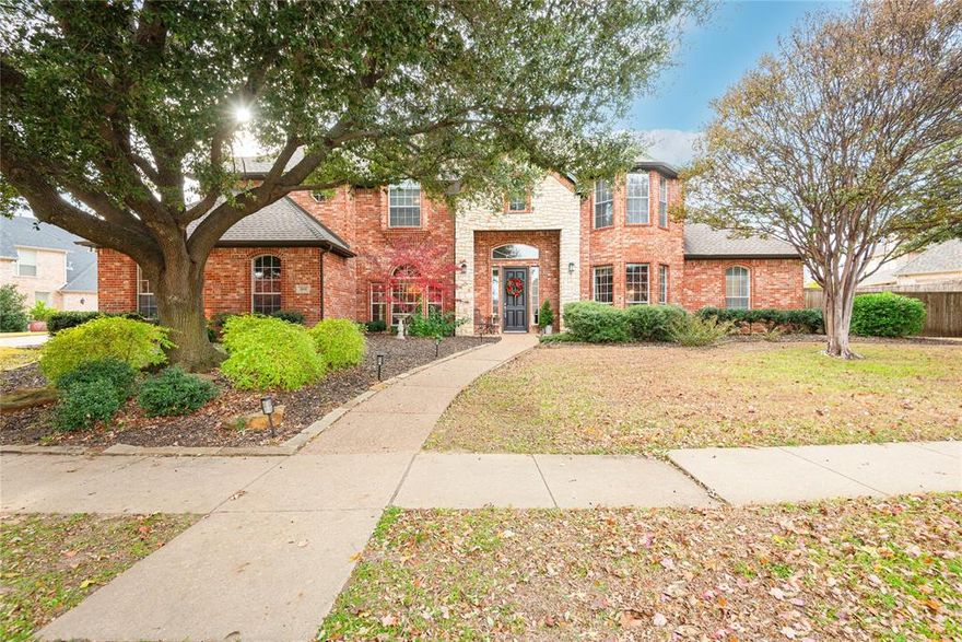 Welcome to this custom-built, original-owner home located in a second-to-none neighborhood within Stonebridge Ranch. Partial lake view with catch and release fishing only steps away. This elegant property offers timeless construction with 100% brick exterior, mature oak and crepe myrtle trees. The large private backyard features a beautifully renovated Foley diving and lap pool, size 38 x 18 x 10 ft. deep, plus room enough in the yard for play area or a flower garden. The home has a primary down and a second bedrm or office down with full bath next to it. 3 bedrooms up with LA. Two attached garages—a 2-car garage and a 1-car garage—provide exceptional storage and parking flexibility. Inside, the home underwent extensive updates, including full interior paint, new flooring throughout most rooms (hardwood, tile, and carpet), window blinds downstairs, and updated kitchen finishes such as leathered granite countertops, stainless steel appliances, shiplap island, backsplash, and hardware on all cabinetry. The primary bath was refreshed with new paint, faucets, toilets, and hardware. Additional features include two fireplaces (living room and primary bedroom), a wet bar off the living room, and a utility room plumbed for a sink with space for an additional refrigerator. Mechanical updates include two water heaters, roof in 2017, underground sprinkler system, downstairs HVAC replaced in 2012, and the upstairs HVAC replaced in 2015. Exterior improvements include fresh exterior paint in 2025 and solar landscape lighting. The pool was fully redone in 2024 with pebble, plaster, travertine, spa enhancements, $2,000 in LED lighting, stabilized skimmers, and an auto filler. Artificial boxwoods are placed outside the dining room window. Stonebridge Ranch offers unmatched amenities, including the Aquatic Center, sports courts, numerous playgrounds, lakes, greenbelts, and strong community appeal. This home delivers an exceptional blend of quality, privacy, location, and lifestyle.