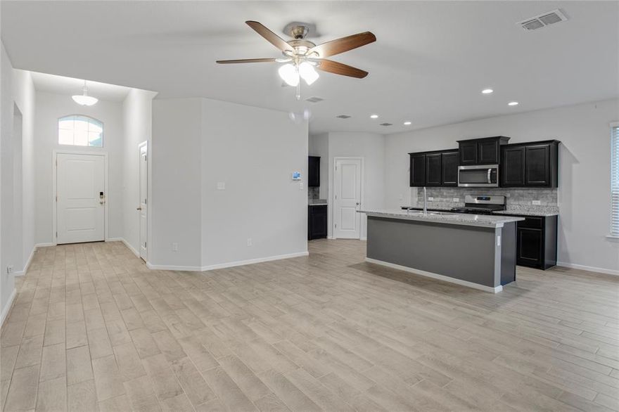 Bring the family and the furniture! Great opportunity for Newer Construction purchase. Appliances are newer and Newer Home - Built in 2022, this 4-bedroom, 2-bath home in Pioneer Point delivers modern comfort and functional flow. The open-concept layout, smart-home features, spacious primary suite, and fully fenced backyard create a turnkey living experience. Appliances still have warranties as well as the homes builder warranty.  Come take a look and fall in love.  The 2-car attached garage and additional parking support multi-vehicle households. Located in Eagle MT-Saginaw ISD with convenient access to parks, walking trails, retail, dining, and major commuter corridors for seamless connectivity throughout Fort Worth.