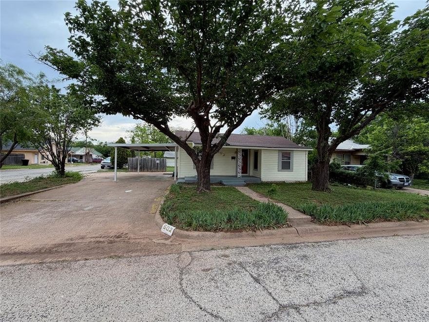 Great home on a corner lot featuring 3 large bedrooms with a possible 4th, great for a large family! This home has 2 large living rooms, full size utility room, and 2.5 baths making the home incredibly efficient for a large family, short term vacation rental, or someone who hosts frequently! Brand new water heater was just installed, fresh paint inside and out, and fresh carpet. The kitchen features a new microwave, range, and granite countertops! Don't miss this rare opportunity to own a large home with tons of updates, under $200,000!