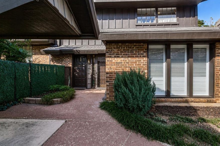 Nestled in a lush North Dallas community, 6959 Helsem Way #139 is a beautifully updated 3-bedroom, 3-bath condominium offering approximately 2,534 sq. ft. of spacious living. This two-level garden-style home features dual primary suites upstairs, each with walk-in closets and fully renovated marble and quartz bathrooms. The updated kitchen, completed in 2021, showcases stainless steel appliances, tile backsplash, and a large pantry, while the oversized living room centers around a cozy gas fireplace and opens to a private patio surrounded by mature landscaping. Built in 1974, the home combines classic character with modern updates, tile flooring, decorative lighting, and abundant storage. Residents enjoy access to exceptional community amenities such as a pool, clubhouse, fitness center, tennis and pickleball courts, and two covered parking spaces. Located in the quiet Hillcrest Condos near top-rated schools, shopping, and major thoroughfares, this home offers the perfect blend of comfort, convenience, and North Dallas charm.
