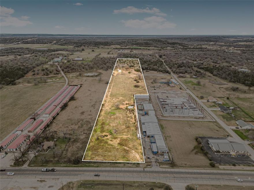 Awesome opportunity to own this 16.311 acres featuring both Commercial and Residential zoning located in thriving city of Mineral Wells. Great visibility with high volume traffic, approximately 205 feet of U.S. Hwy 180 frontage, zoned Commercial approximately a fifth of the way back, with the rest zoned Residential. Very close to medical centers and adjacent to one of the most sought-out neighborhoods in the area, this property is also on the popular route to Possum Kingdom Lake from DFW. Property features cleared frontage, some trees and a pond. Improvements include City water and electricity installations and a nice concrete slab for an RV or building. 1200 FT X 20 FT easement at front left boundary of property granted to Oncor Electric Company in May of 2022. So much potential for a business, home build or both! Survey available.