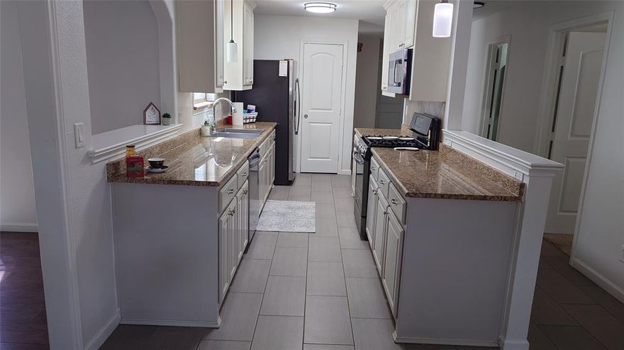 Prime Location! Updated 4-Bedroom Home Just Minutes from DFW

LOCATION, LOCATION! This move-in ready 4 bedroom, 2 bath gem is perfectly positioned with quick access to Highways 183, 360, and 121, plus you're just minutes from DFW Airport, major employers, and shopping centers.

The spacious layout includes a generous living area and a 2 car enclosed garage, with numerous recent upgrades that offer peace of mind and modern comfort:

Plumbing fully replaced (2022)

New roof (2023)

New AC unit (2021) + all air ducts professionally cleaned (2025)

New microwave (2025)

Transferable foundation warranty

Fridge included (only 2 years old)

Out back, enjoy a 12x18 storage along with a large 18x18 covered patio, great for entertaining or relaxing outdoors.

Homes like this, in a location this good, don’t come around often. Schedule your showing today before it's gone!