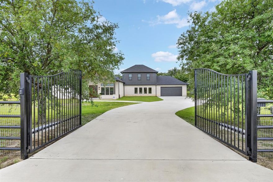 This one truly stands apart. Set on 5+ picturesque acres in a premier horse country location, this exceptional property has been completely taken down to the slab and thoughtfully rebuilt in 2024–2025. Offering the rare combination of modern luxury and timeless land appeal.
Inside, you’ll find a spacious and versatile layout featuring 4 bedrooms, 5 full bathrooms, 1 half bath, a private home office, and a media and flex room providing endless options for entertaining, multi-generational living, or work-from-home needs.
The heart of the home is a stunning, open-concept kitchen designed with today’s most sought-after finishes, including quartzite countertops and full backsplash, a built-in Thermidor smart refrigerator, a monogram gas and electric range, an oversized appliance pantry, and an expansive laundry room designed for both beauty and function.
Step outside and experience resort-style living. The property showcases a completely updated pool paired with an outdoor cabana featuring a wood-burning fireplace, creating the perfect setting for year-round entertaining and relaxing evenings under the stars.
Equestrian enthusiasts will appreciate the fully equipped setup, all secured behind a private electric gate. The acreage features a 3-stall barn with attached runs, tack room, feed room, storage space, and an equipment, trailer shed. The sandy loam soil is ideal for horses, with ample space to add a riding arena just beyond the barn. Mature 300+ year-old pecan trees add incredible character and shade, while a dedicated area offers the perfect opportunity to create a private garden retreat. The road into the property is possibly going to be paved in the near future. This home has only been occupied for approx. 2 weeks and is practically brand new. 
With room to roam, refined finishes throughout, and every detail carefully considered, this is a rare opportunity to own a fully reimagined estate in one of North Texas’ most desirable equestrian settings.
