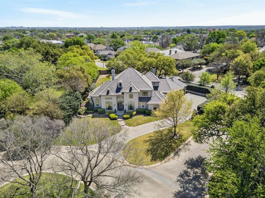 Tucked behind the private gates of Bradford Park—an ultra-exclusive enclave of just seven residences—2125 Bradford Park Court offers a truly rare opportunity to own in one of Fort Worth’s most coveted and tightly held locations. Positioned moments from Westover Hills and Four Oaks Lane, this address represents a level of prestige, privacy, and proximity that is seldom available. Set on a half-acre, this timeless home spans 4,072 square feet and was masterfully built by Morrison Group with a focus on quality and timeless design. With approximately 3,100 square feet on the main level, the layout is tailored for refined, effortless living. The primary suite and a private guest en-suite are ideally situated on the first floor, along with a dedicated office and two half baths. Upstairs, two additional en-suite bedrooms, a spacious game room, and an outdoor deck create a private retreat for family and guests alike. The kitchen opens to the family room offering updated appliances, gas range, and butler's pantry. The DaVinci slate roof, newer Marvin windows, stucco exterior, tankless water heaters, newer HVAC units, landscape lighting, and rich wood flooring reflect a commitment to both craftsmanship and longevity. The remarkable grounds offer exceptional flexibility—with room for expansion and pool. Standout features include the 3-car garage and the approximately 1,500 square feet of walkable attic space spanning the full length of the home—an extraordinary offering for future expansion or storage. In a city where location defines long-term value, properties within Bradford Park are seldom brought to market. The idyllic park-like setting features a private park centrally located in the heart of the neighborhood. 2125 Bradford Park Court is not simply a home—it is a rare and irreplaceable position within Fort Worth’s most prestigious landscape. Premier gated community moments from Shady Oaks Country Club and River Crest Country Club.