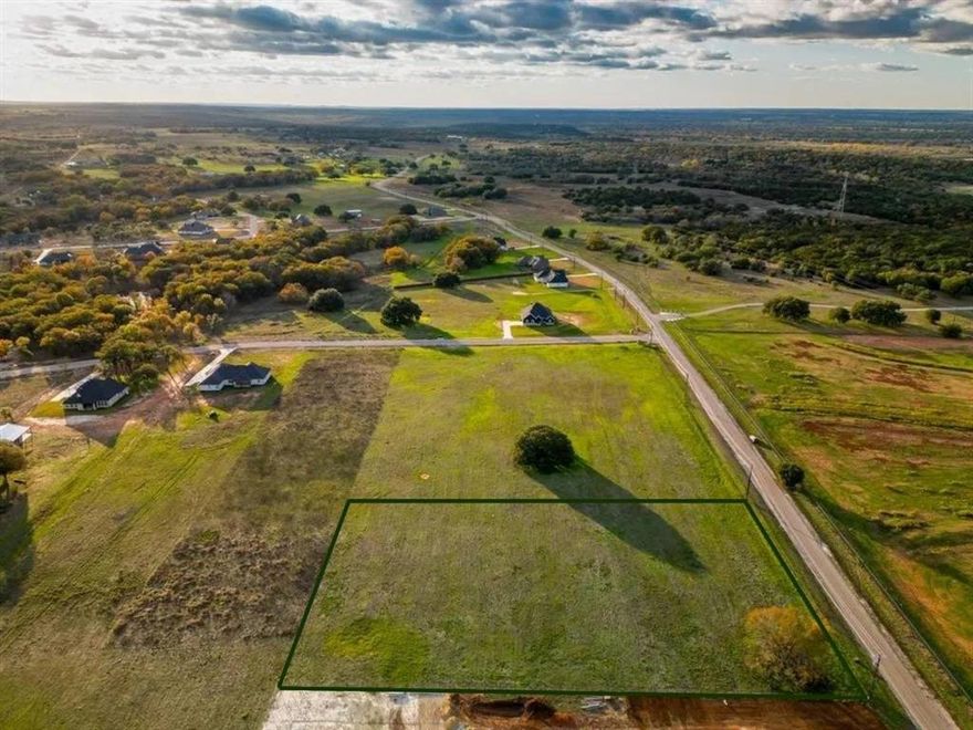 Brand new water well included! Seize the chance to own this breathtaking 2-acre lot at 157 Cartwright—a hidden gem perfectly poised between Weatherford and Granbury, where your dream lifestyle awaits! Picture your custom-built home just blocks from the scenic Brazos River, surrounded by opportunities for boating, fishing, and unforgettable riverfront views. This cleared, private lot offers limitless potential: no HOA restrictions give you the freedom to create your ideal retreat, with ample space for horses, fencing, or a stable. Electrical infrastructure is already in place—add a septic, and you’re ready to bring your vision to life with the builder of your choice. This location is a goldmine of convenience and growth! A new Costco store is just minutes away on i20, putting everyday essentials at your fingertips. Families will adore the top-rated Weatherford ISD schools, and Granbury’s charming array of shops, restaurants, and cultural hotspots is a short drive off. Whether you’re building your forever home now or securing a prime investment, this lot delivers rural tranquility with urban perks in a fast-evolving area. This rare opportunity won’t last long! Make an offer today!