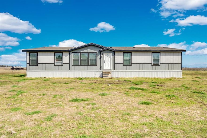 Beautiful home situated on over an acre, offering space, flexibility, and country-style living with modern conveniences. This 5-bedroom, 2.5-bath property features a unique and versatile layout, including a fifth bedroom connected to the primary bathroom with its own private entrance — perfect for a home office, nursery, gym, or private retreat. One secondary bedroom is also connected to the half bath and has a separate entrance, making it ideal for guests or multi-generational living.

Step outside to enjoy the back patio with a cozy fireplace, the perfect spot to relax and take in the sunset views. The property is equipped with city sewer and co-op water, located in the county for added freedom, and has no HOA.