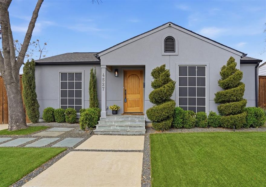 Thoughtfully reimagined and truly move-in ready, this beautifully updated Dallas home showcases pride of ownership at every turn. Offering 3 bedrooms, 3 bathrooms, and a 1-car garage. The layout allows flexibility to convert the primary bedroom into a spacious 2nd living space to suit your needs. This home is designed for both everyday comfort and effortless entertaining. The backyard is a standout feature with a stunning custom pool equipped with electric heating and cooling—perfect for year-round enjoyment. The backyard is wired with an outdoor speaker system and television that create the perfect ambiances for grilling and pool lounging. The professionally landscaped turf in both the front and back yards keeps the property lush and green with minimal maintenance. The garage expands the home’s entertaining options featuring heating and air conditioning so guests can comfortably gather indoors to watch TV or escape the Texas summer heat. A large walk-in closet at the back of the garage—previously used as a fashion connoisseur’s retreat—can easily be transformed into a man-cave, she-shed, creative studio, or additional storage.  The home is secured by a striking 8-foot board-on-board privacy fence with sleek metal doors and an electric gate, providing easy access to the extended rear driveway. Additional exterior perks include an electric vehicle charging port and an outdoor power outlet suitable for an RV or generator. Inside, you’ll find recessed lighting throughout, manufactured wood flooring, updated baseboards and trim, and thoughtfully designed custom closet shelving, racks, and drawers that maximize space. The kitchen is an entertainer’s dream with gleaming quartz countertops, stainless steel appliances, and a sophisticated built-in mini bar. All of this is perfectly situated in one of Dallas’ most beloved neighborhoods, just minutes from boutique shopping, acclaimed dining, parks, SMU, Dallas Love Field, and the Park Cities.