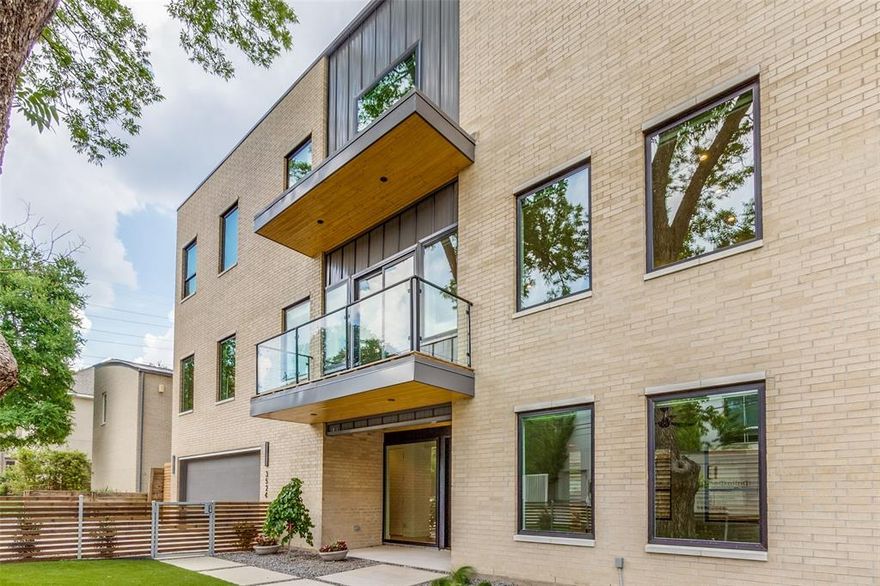 Discover contemporary elegance steps from Katy Trail in highly sought-after Northern Heights neighborhood! Stunning 3 Bedroom, 3.5 Bath home is bathed in natural light on all levels & offers accessibility via stairs or elevator. The first level featuring an inviting foyer hosts a guest bedroom with ensuite bath & convenient mudroom by garage. Ascending to the second level, you are greeted by a bright and open living area with large balcony & gas fireplace which leads to the dining area with wet bar & into a chef's kitchen equipped with SS appliances, Quartz counters, sleek cabinetry and large pantry! The uppermost level has luxurious primary suite & spa-like bath with dual vanities, separate shower, soaking tub & large walk-in closet. Another bedroom on this level has ensuite bath & walk in closet. Additionally, a laundry room with sink completes this level. Enjoy the vibrant Knox Travis area and all it has to offer! Ease of access to 75 & Tollway make commutes a breeze!