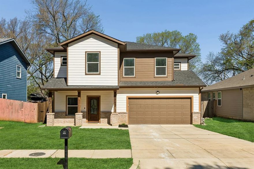 Built in 2023, this beautifully designed two-story home offers modern style, a functional layout, and an unbeatable location just minutes from downtown Dallas. With 4 bedrooms, 2.5 baths, and approximately 1,748 square feet, the home provides a bright, open-concept living space ideal for both everyday living and entertaining. The spacious living area is anchored by a striking stone fireplace, creating a warm and inviting focal point. It flows seamlessly into the kitchen, where granite countertops, stainless steel appliances, custom cabinetry, and a large island provide both style and functionality—perfect for hosting and gathering. The primary bedroom is conveniently located downstairs, offering privacy and ease of access. This inviting retreat features an ensuite bath with dual vanities, a walk-in shower, and a generous walk-in closet. Upstairs, three additional bedrooms provide flexible space for guests, home office, or hobbies, along with a well-placed laundry room for added convenience. Enjoy outdoor living with a welcoming front porch and a large backyard offering plenty of room for recreation, pets, or future enhancements. A two-car garage adds convenience and storage. Ideally situated near parks, trails, dining, and entertainment along the Trinity River corridor, this home combines comfort, modern finishes, and a prime location. Move-in ready and designed for today’s lifestyle—schedule your showing today.