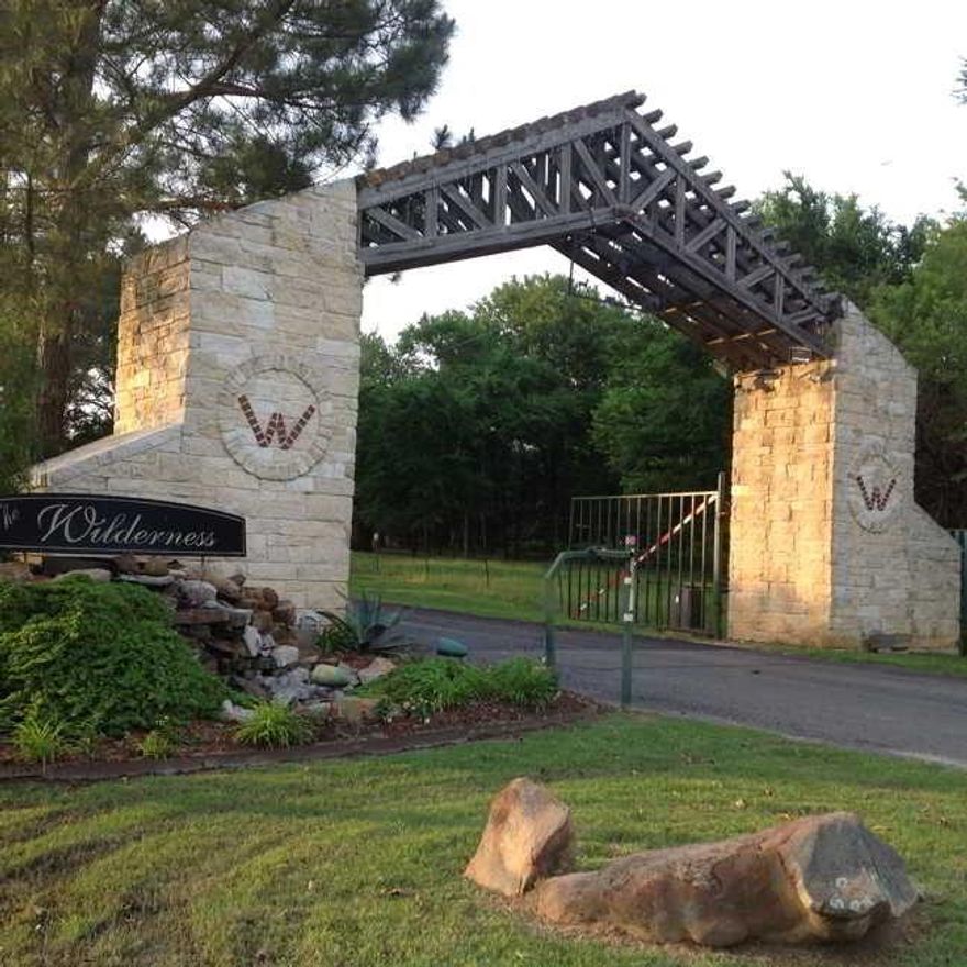 Welcome to The Wilderness at Richland Chambers Reservoir, where the foundation for your dream home awaits on this beautiful, heavily wooded lot. Nestled inside a private, gated community, this exceptional homesite offers the perfect blend of security, serenity, and natural beauty. Imagine waking up surrounded by towering oak and pine trees, with abundant wildlife—including roaming deer—creating a peaceful, storybook setting that feels worlds away from the everyday hustle. The Wilderness is thoughtfully designed to preserve its natural charm, with site-built homes only, ensuring long-term value and a cohesive, high-quality community. This lot is ideal for a custom home designed exactly to your vision, whether you’re seeking a weekend retreat or a full-time escape into nature. Best of all, ALL UTILITIES ARE READY, allowing you to move forward with confidence and ease. If you’ve been searching for a place where privacy, beauty, and possibility come together—this is it. Build your future here and experience the quiet luxury of life at The Wilderness. Lot 127 can be purchased in addition