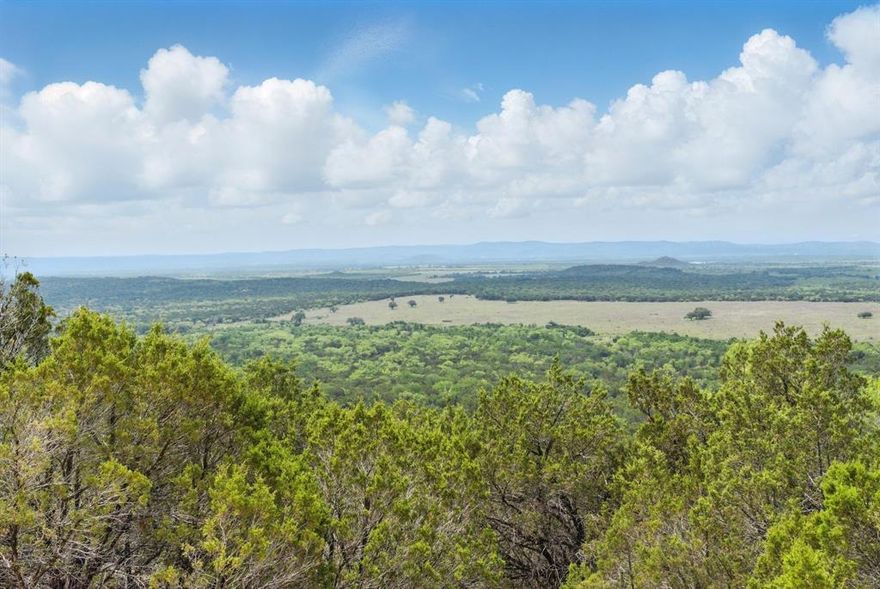 This expansive 716-acre property in Gordon, Texas offers a rare combination of natural beauty, seclusion, and versatility. Anchored by a striking mountain that adds both character and elevation to the landscape, the land features rolling terrain densely covered with mature trees, creating a rich habitat for an abundance of wildlife. Whether you're looking for a recreational retreat, hunting property, or working ranch, this land provides the ideal setting. Three tanks located across the property, support livestock and native game, while enhancing the overall utility and scenic appeal. The entire acreage is perimeter fenced, offering immediate functionality for cattle or other livestock operations. With its diverse topography or scenic views, this property presents a unique opportunity to own a substantial and distinctive piece of Texas.