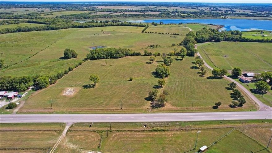 Prime 13 Acre Development Opportunity with Highway Frontage Near Paris Texas

This exceptional 13 acre property offers outstanding visibility and accessibility with direct frontage on Hwy 37, just outside the Clarksville city limits while remaining only minutes from town amenities. Its strategic location provides the advantage of high traffic exposure while maintaining the flexibility often found outside city restrictions.

Situated adjacent to Langford Club Lake, the property features open pasture, a shallow pond, and a natural tree line along the rear boundary that adds privacy and scenic appeal. The level topography and usable acreage make this tract especially attractive for future development.

Infrastructure advantages include two existing commercial driveways off Hwy 37, creating multiple access points and improving traffic flow for future business or development use. Utilities are available nearby, providing a clear path for future connection and buildout.

With strong highway exposure and excellent accessibility, this property presents a wide range of potential uses including commercial development, RV park, storage facility, business headquarters, or investment hold for future growth as the Paris area continues to expand.

Properties with this level of highway visibility, acreage, and development flexibility are increasingly difficult to find. This tract offers a rare opportunity to secure a highly strategic location in a growing corridor of Northeast Texas.