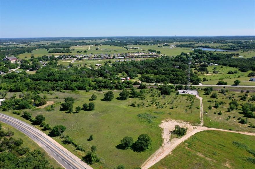 20 Acres in Alvord Texas! This parcel has a decent amount of frontage on US Business 287 leading into Alvord from the south. The property is currently  showing to be inside city limits and zoned for residential, but with the amount of frontage, would be a great parcel to talk to the city about rezoning and making it commercial. The property does have a cell tower located at the back but overall still plenty of room for future plans and growth in Wise county and Alvord specifically!