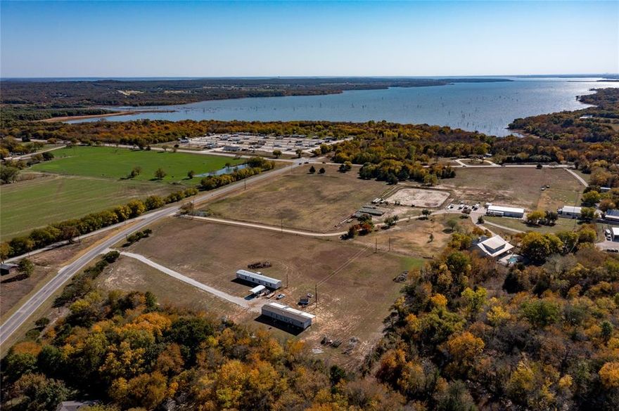 RARE FIND! This versatile 4.5-acre property offers two updated mobile homes, each with its own septic system and shared access to a private water well, making it an exceptional opportunity for buyers seeking space, privacy, and built-in rental potential. Both homes feature 3 bedrooms, 2 bathrooms, and open-concept living—one manufactured in 2021 with 1,200+ sq ft, the other offering 1,376 sq ft, quartz kitchen counters, and a cozy wood-burning fireplace. Enjoy expansive outdoor space, a secure electric entry gate, fenced yard areas, and plenty of additional unfenced acreage for recreation or future improvements. The land is partially designated for each home with remaining acreage as shared common space. With no water or sewer bills, peaceful surroundings, and close proximity to Lake Ray Roberts and I-35E, this property delivers convenience and country living in one package. Added bonus: the property already has 2 years of agricultural history through beekeeping toward a 5-year AG exemption—an incredible value for long-term tax savings. Located outside of the city limits. No city taxes! Opportunities like this rarely hit the market! Seller is also offering 7 acres with all improvements on the property at 550K if interested in more acreage.