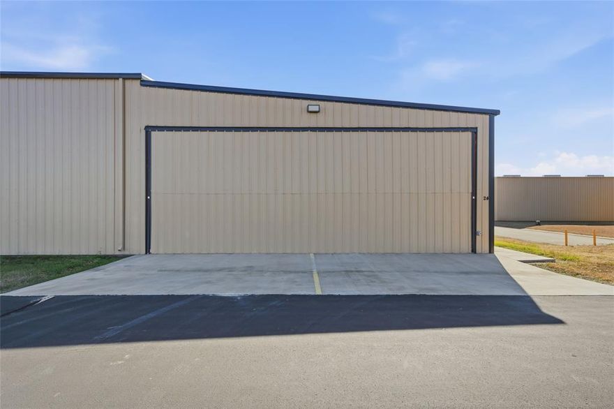 Your Personal Aviation HUB Privately Owned Airplane Hangar for sale at McGregor Executive Airport.  Discover a well-equipped 2100 sq ft airplane hangar located at the convenient and growing McGregor Executive Airport.  This versatile hangar offers everything needed for aircraft storage, maintenance, or aviation operations.  Features include:  42' x50' hangar, including a concrete pad, apron, and sidewalks, constructed on an individually surveyed, leased lot.  Main Access: 1 - 38' x 14' hi-fold door for easy aircraft entry and exit.  Side Entries: 2 - 3' x 6'8 side entry doors for convenient access.  Rear Access: 1 - 8' x 8' rear entry rollup overhead door for additional versatility.  Utilities: water meter and sewer hookup ensure easy utility management.  Electrical Setup:  Commercially wired with standard plug outlets, 6 interior LED ceiling lights and 2 exterior LED flood lights.  24-hour access:  Enjoy unrestricted access to your hangar at any time, day or night.  Epoxy flooring:  The finishing touch of the epoxy flooring not only looks great but is also low-maintenance and easy to clean.  Spray-foam insulation for improved temperature control and energy efficiency.  Work and play, you have the perfect space for tinkering, repairs, or even some light modifications.  Runway proximity:  you'll enjoy the convenience of quick take-offs and landings.