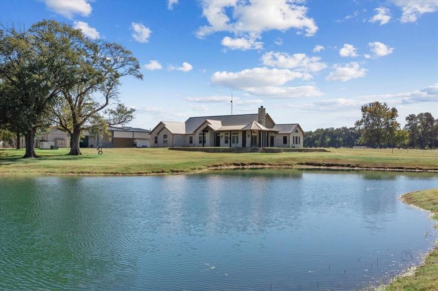 On this amazing property you will find all the amenities needed to carry on top notch ranch operations. The main house is a custom build completed in 2016 with no expense spared. Hardwood floors throughout with granite countertops and Viking appliances. The home has an open floorplan with large rooms and closets as well as an oversized garage and tons of front and back porch space as well as a whole home Generac propane generator. Outside you will find a 600 sq ft 2 bed 1 bath bunkhoiuse with full kitchen as well as a massive 40x60 insulated and heated shop with 20x60 awnings on each side and 20x40 awning in front. Property also has a horse barn with 4 stalls, tack and feed rooms and chicken coops. There is also an 80x50 equipment shed perfect for large equipment or for storing hay. The improved bermuda grass pastures are cross fenced with ponds in each one for ease of handling and custom designed working facilites. This ranch has been intensively managed and is ready to work for you.