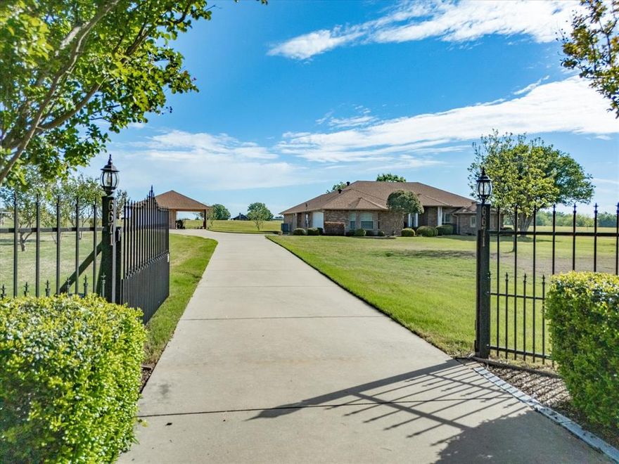 **Price improvement due to change in acreage** Discover the perfect blend of peaceful country living and everyday convenience on this beautiful 4-acre property in Ennis ISD. This spacious 4-bedroom, 2-bath well maintained home offers room to spread out with two comfortable living areas, ideal for entertaining or relaxing with family. The oversized primary suite is a true retreat, featuring dual closets, separate vanities, and a large jetted tub for unwinding at the end of the day. One secondary bedroom includes built-in cabinetry and a desk—perfect for a home office, study space, or hobby room. The home features a cozy Heatilator fireplace, adding warmth and charm to the main living space. A 2-car attached garage provides convenience, while the detached 1-car garage with an attached carport—designed to match the home—offers additional storage and parking flexibility. Step out onto the oversized covered patio and enjoy wide-open Texas skies, a scenic pond, and growing pecan trees that provide the ag exemption. The property is fully fenced with an electric gate, providing both privacy and security. This property has it all. Schedule your showing today.

Experience the best of both worlds—quiet country living with the convenience of a short drive to nearby cities for shopping, dining, and commuting.